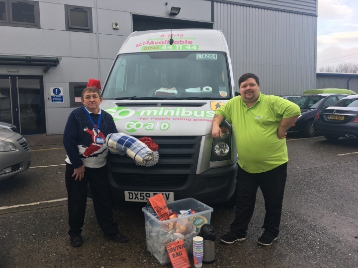 Taxi drivers donating food and blankets to the homeless